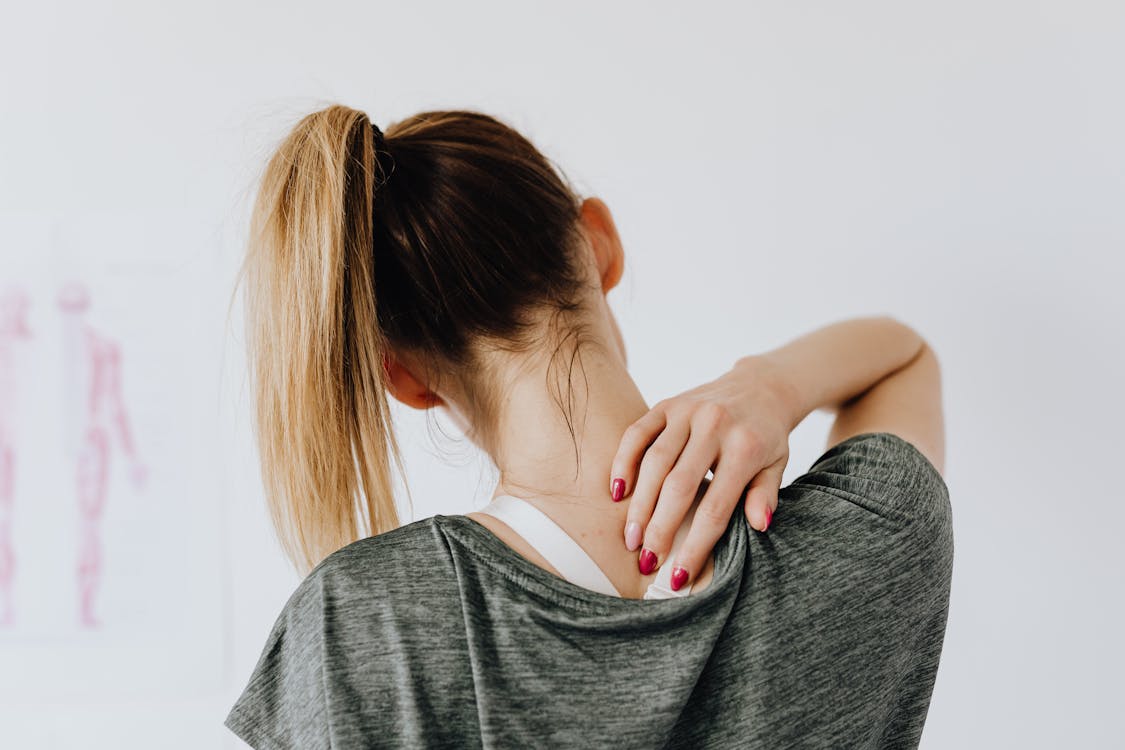 Chiropractor assessing a patient at City Integrative Rehabilitation